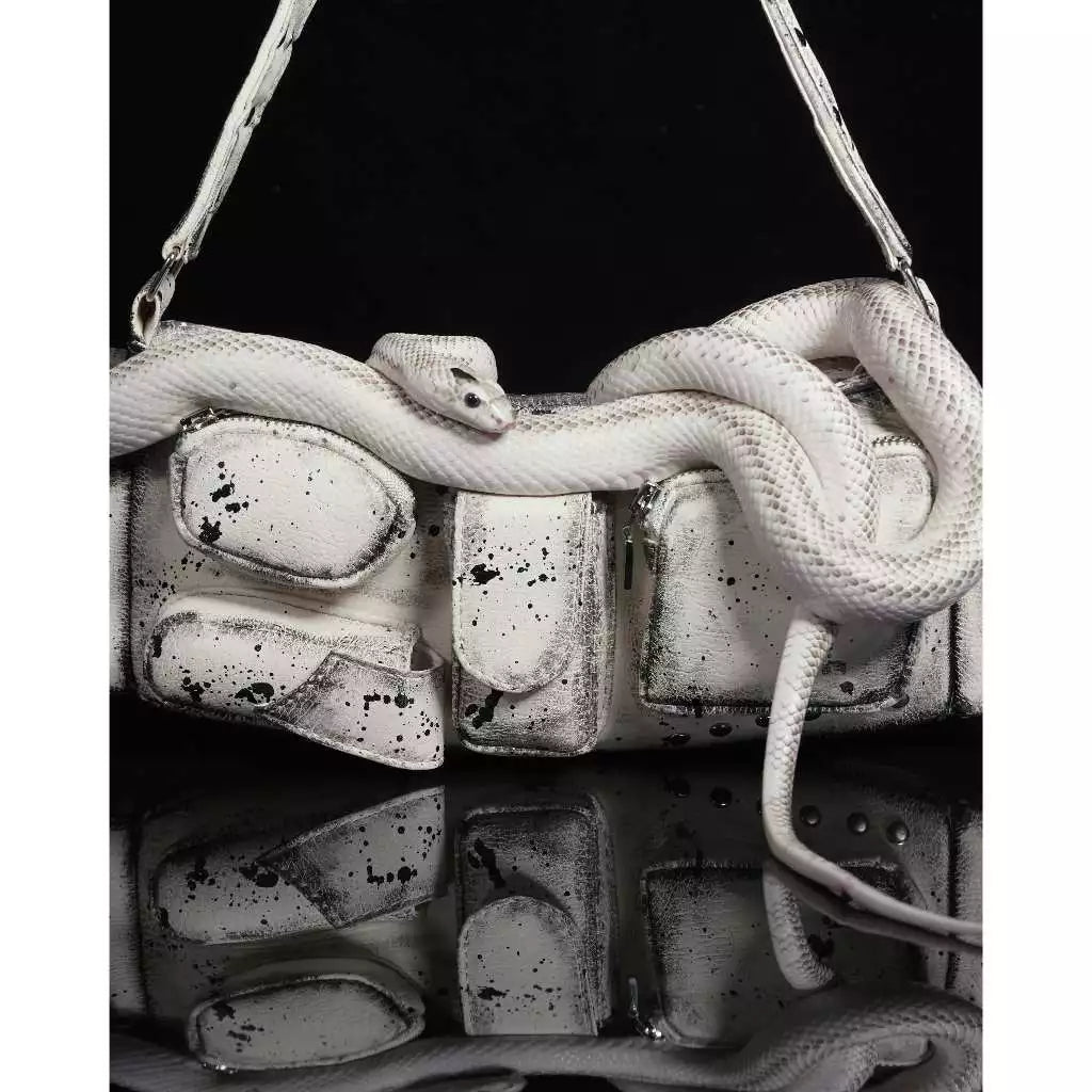DIRTY ESMERAY CLUTCH BAG